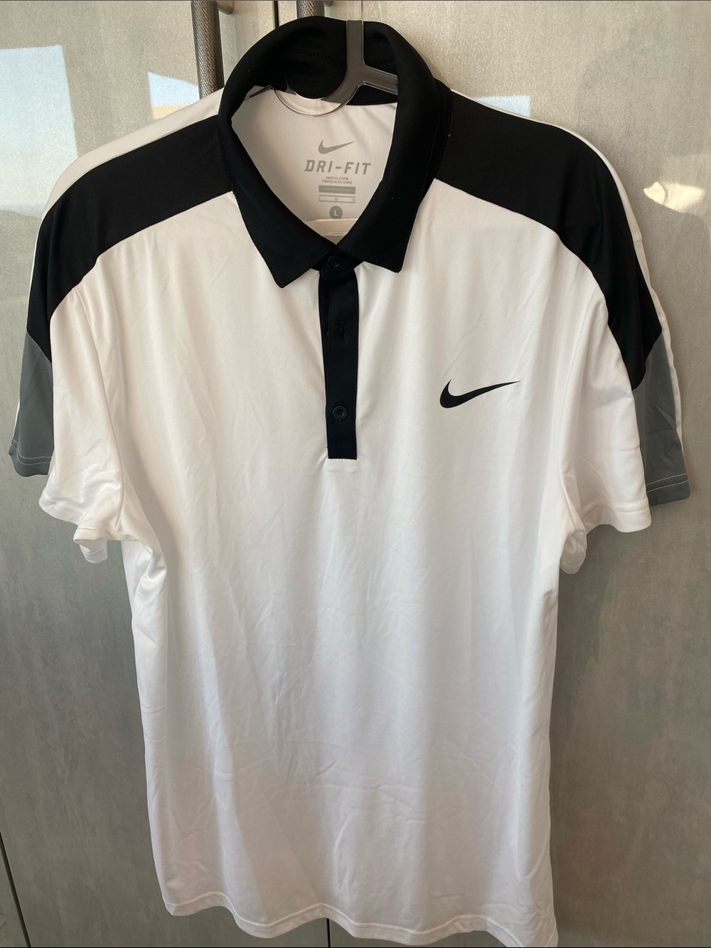 Nike White athletic Polo with Black Contrast Shoulders & Swoosh size Large